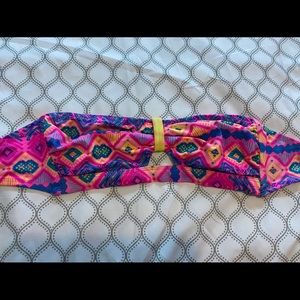 pink and yellow strapless top